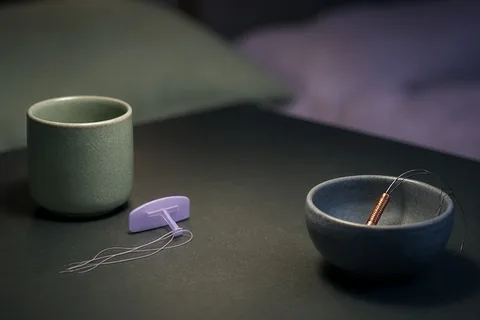 Illustration for Mirena vs Paragard: How to Choose the Right IUD